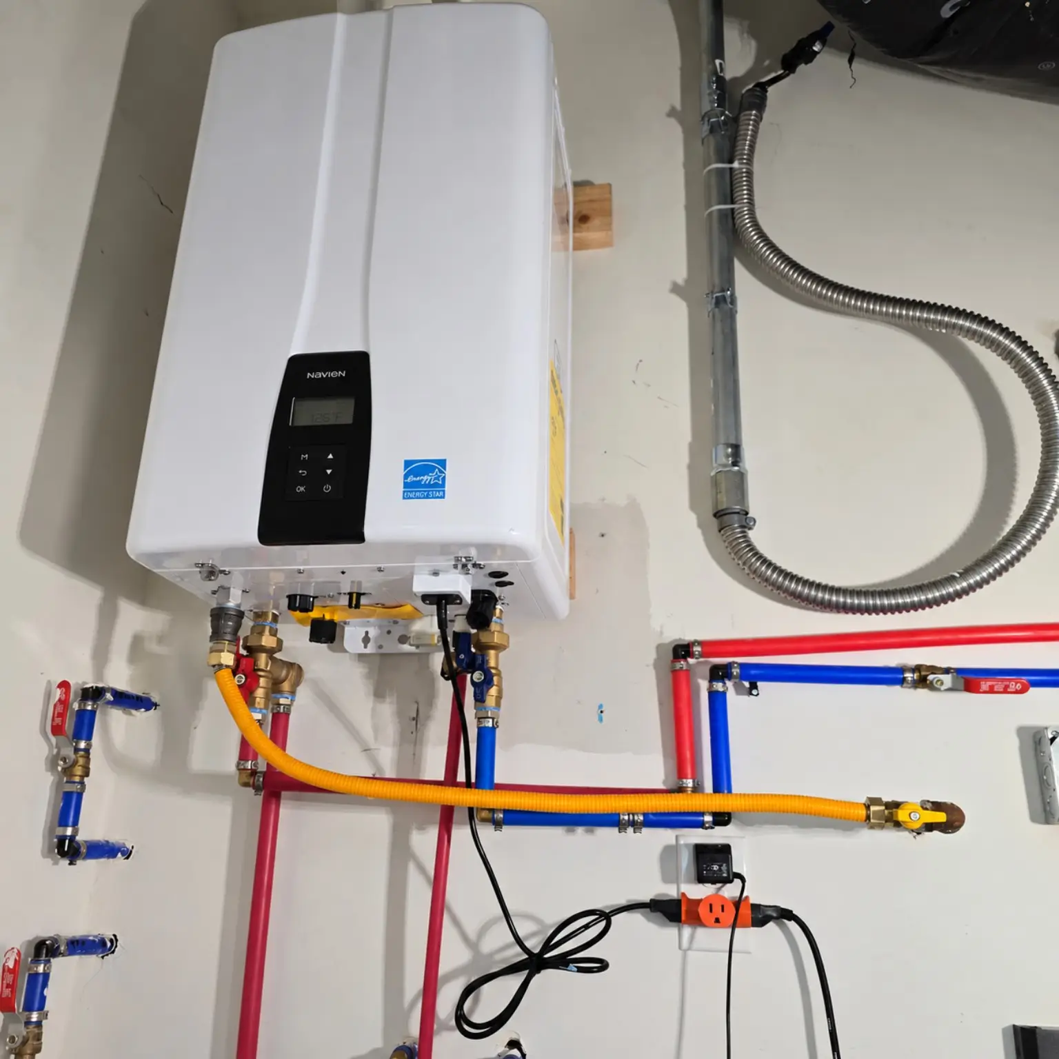 Flowtera Plumbing Navien tankless water heater installation